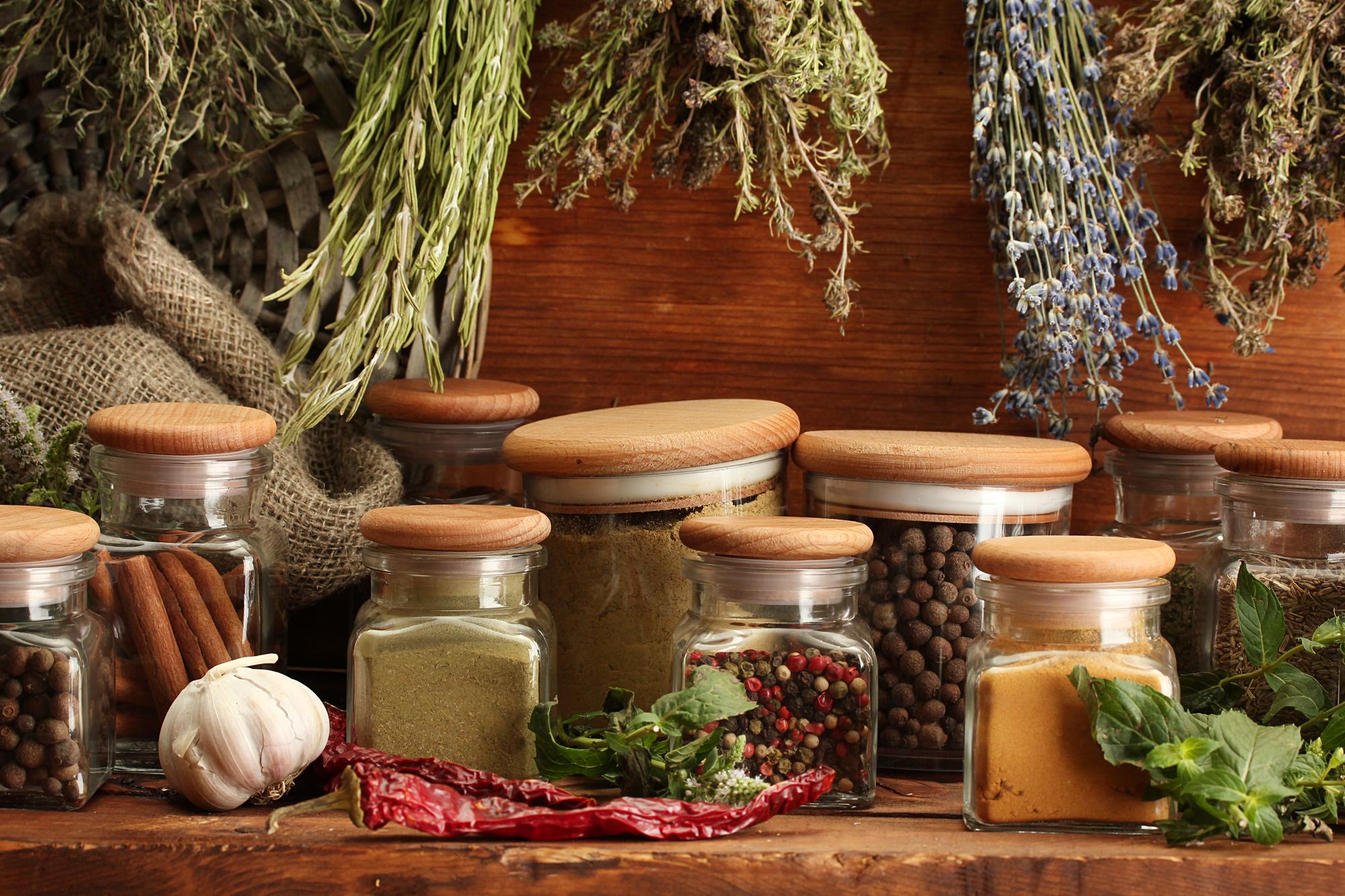 small kitchen studio with spice jars and wooden board